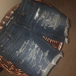 Destroyed denim Bermuda shorts
